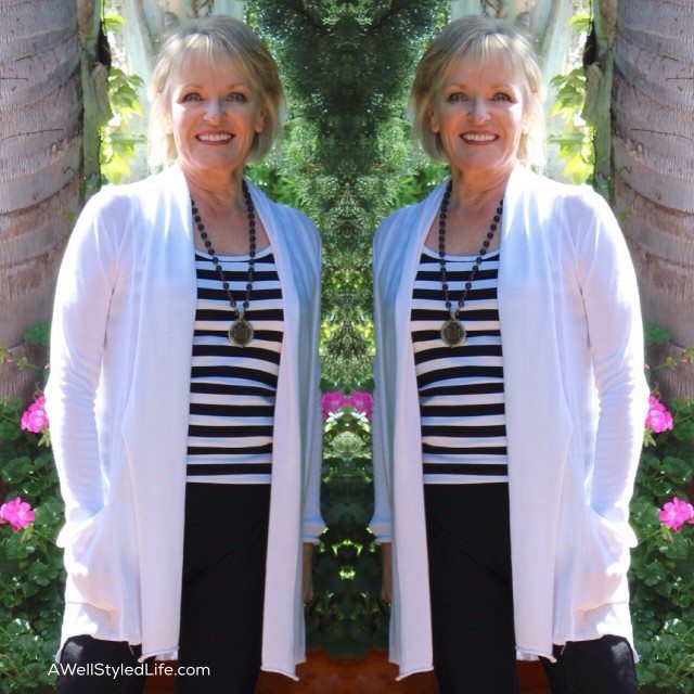 Wearing a longer necklace with a tunic sweater helps you appear taller.