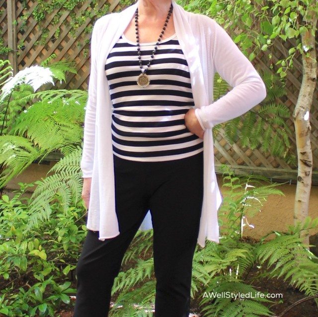 Sideways stripes do not add weight to your look when you wear a tunic to cover the outsides of your body.