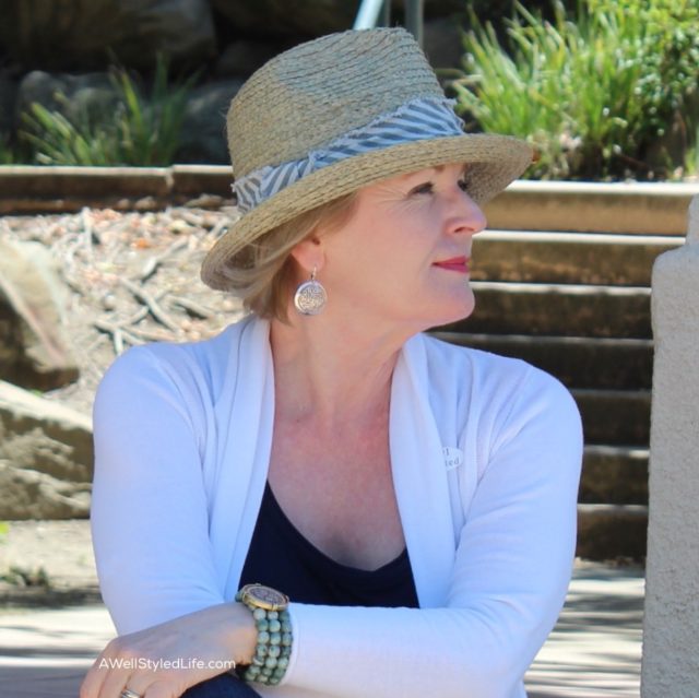 A hat adds polish to everyday casual style.