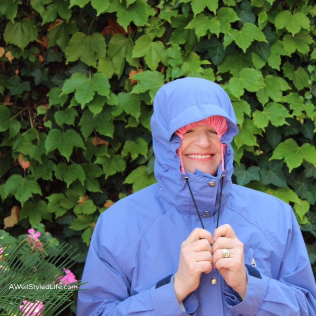 hood and wind flaps down on North face rain jacket