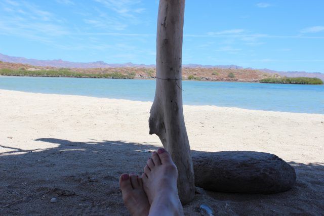 relaxing on a deserted beach