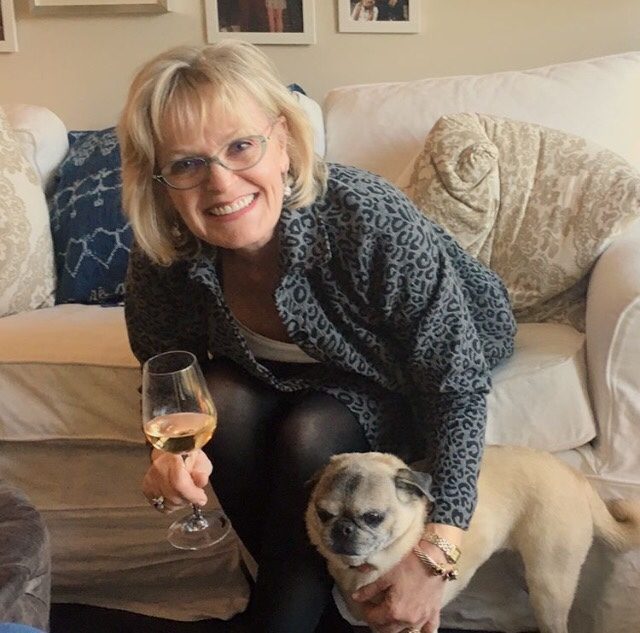 enjoying a glass of wine after a long day flying