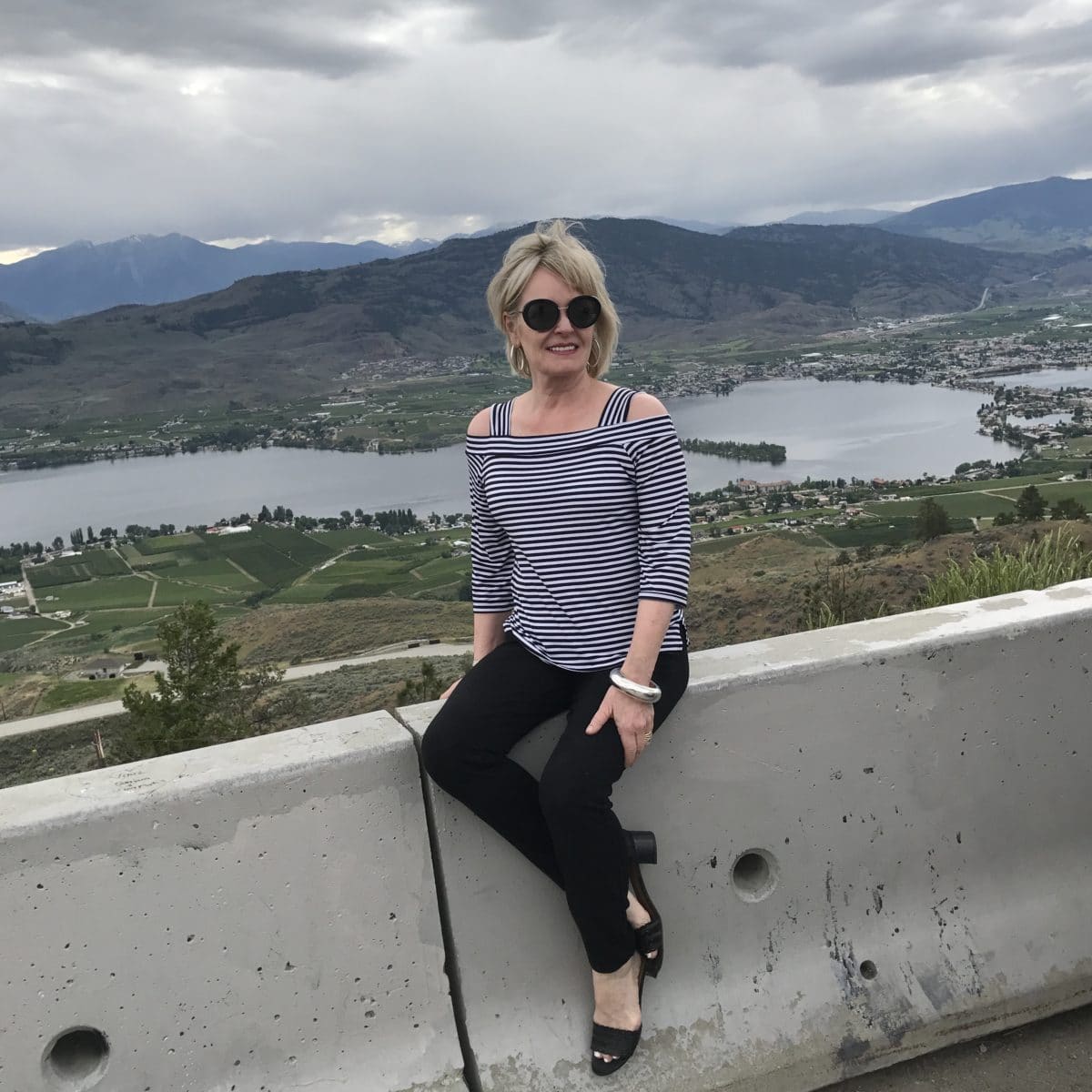 Jennifer Connolly wearing Chico's cold shoulder top