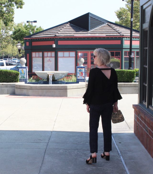 Jennifer Connolly of A Well Styled life wearing v-neck bell sleeved top