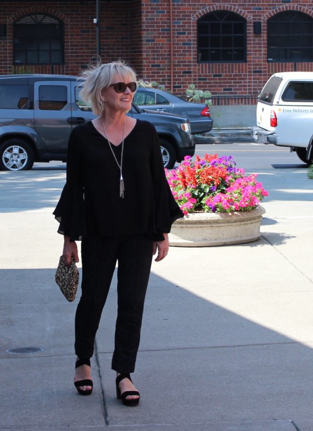 Jennifer Connolly of A well Styled Life modeling bell sleeves