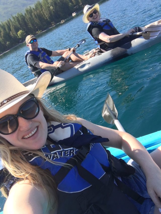 Jennifer Connolly of A Well Styled Life kayaking on Lake McDonald
