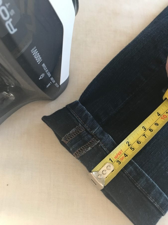 measuring thelength to shorten jeans