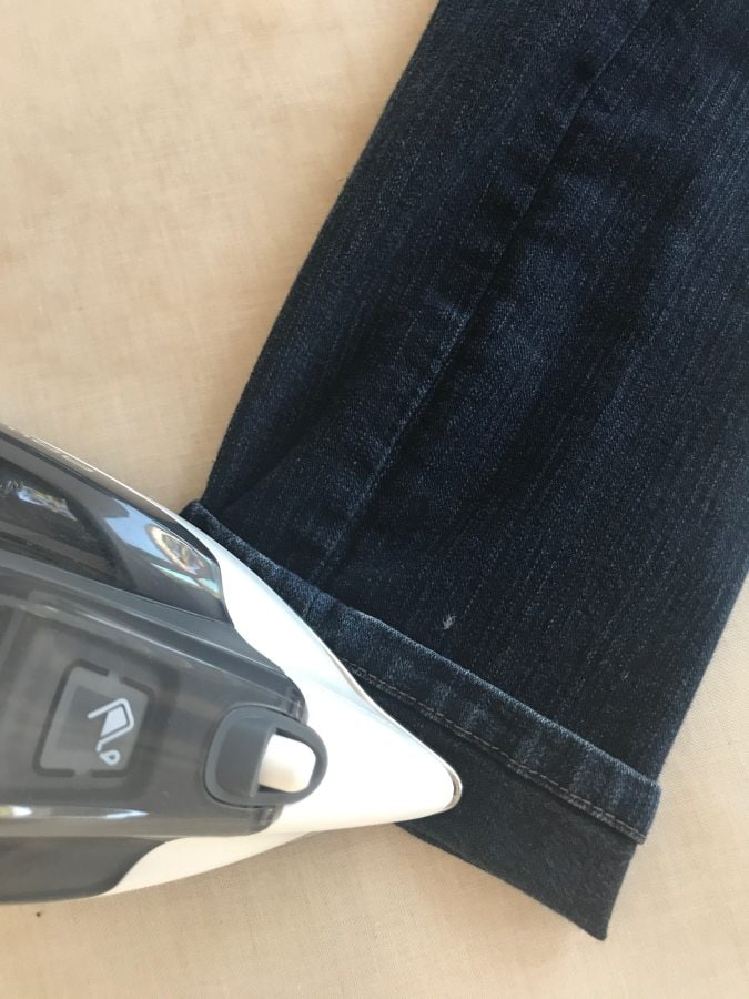 pressing a hem in jeans
