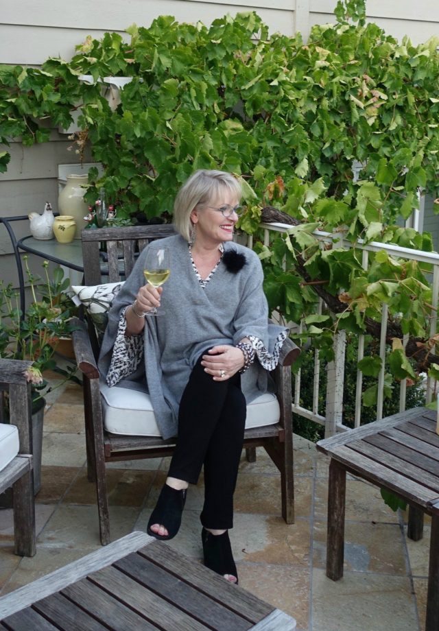 Jennifer Connolly of A Well Styled life wearing cashmere poncho from Nordstrom