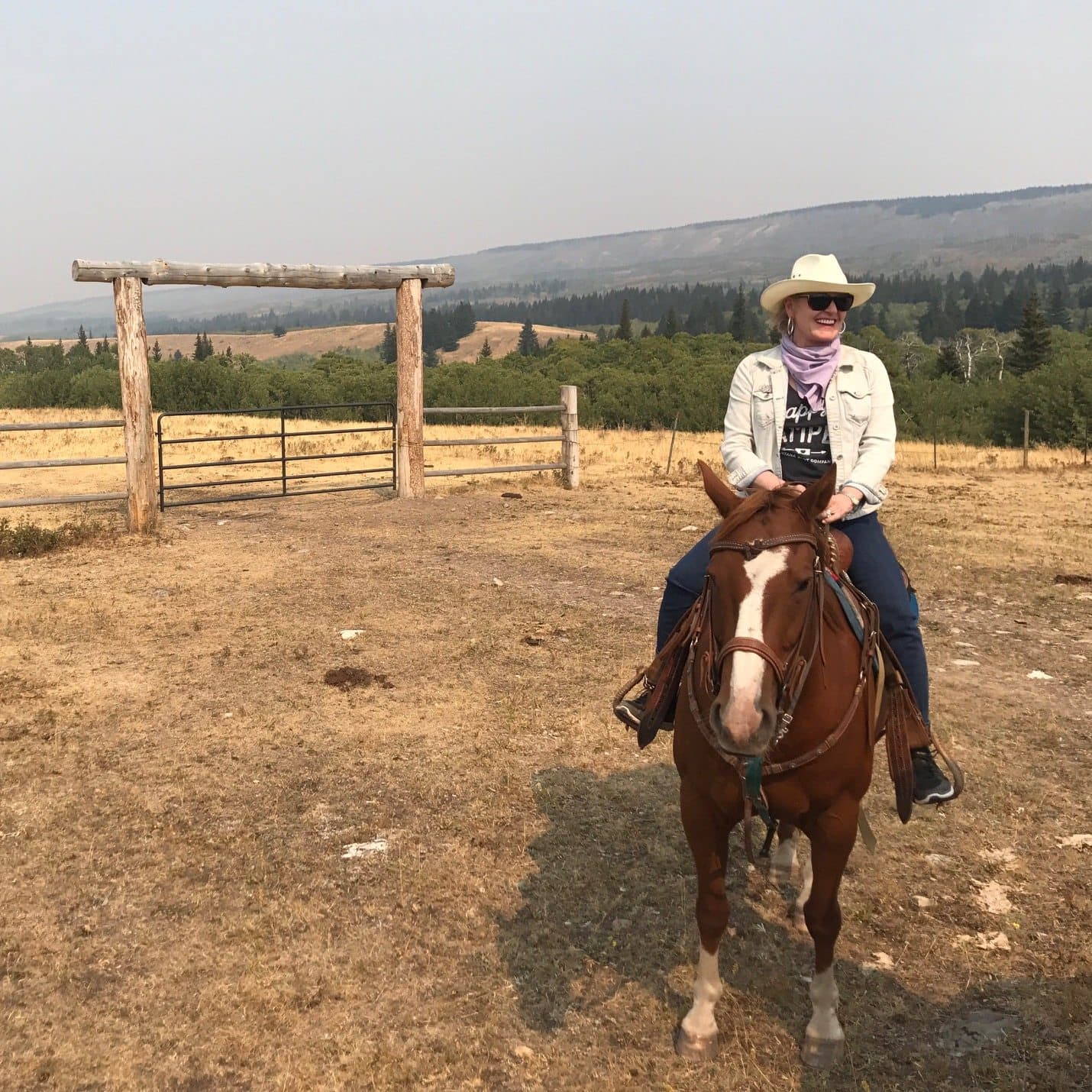 Jennifer Connoily of A Well Styled life riding a horse
