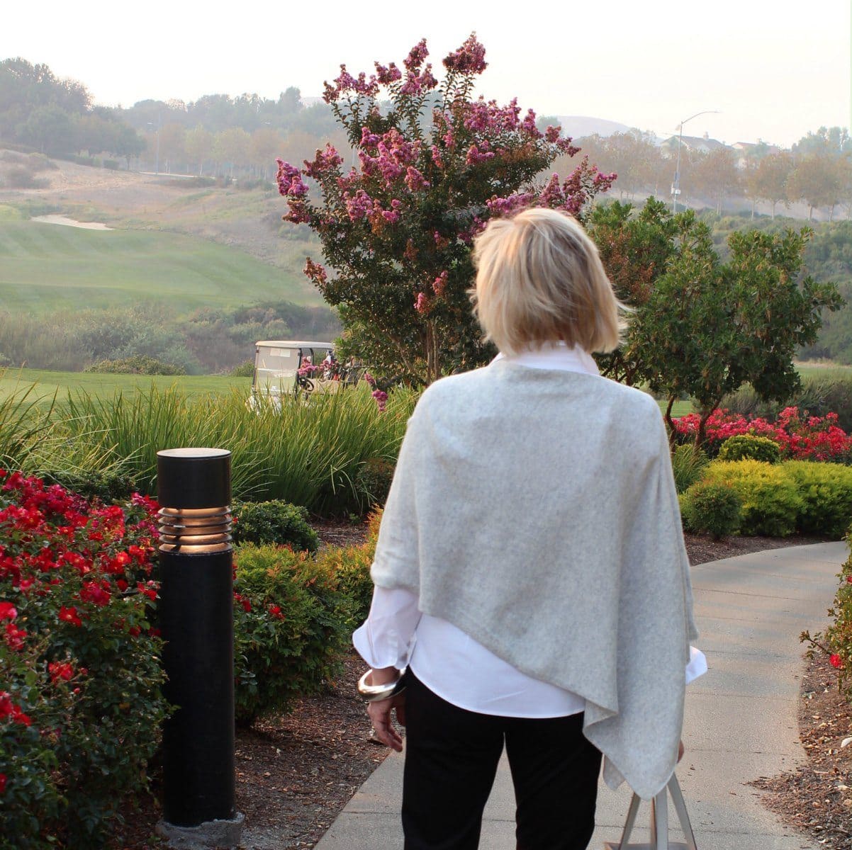 Jennifer Connolly of A Well Styled Life wearing Claudia Cashmere topper from Purple Poppy