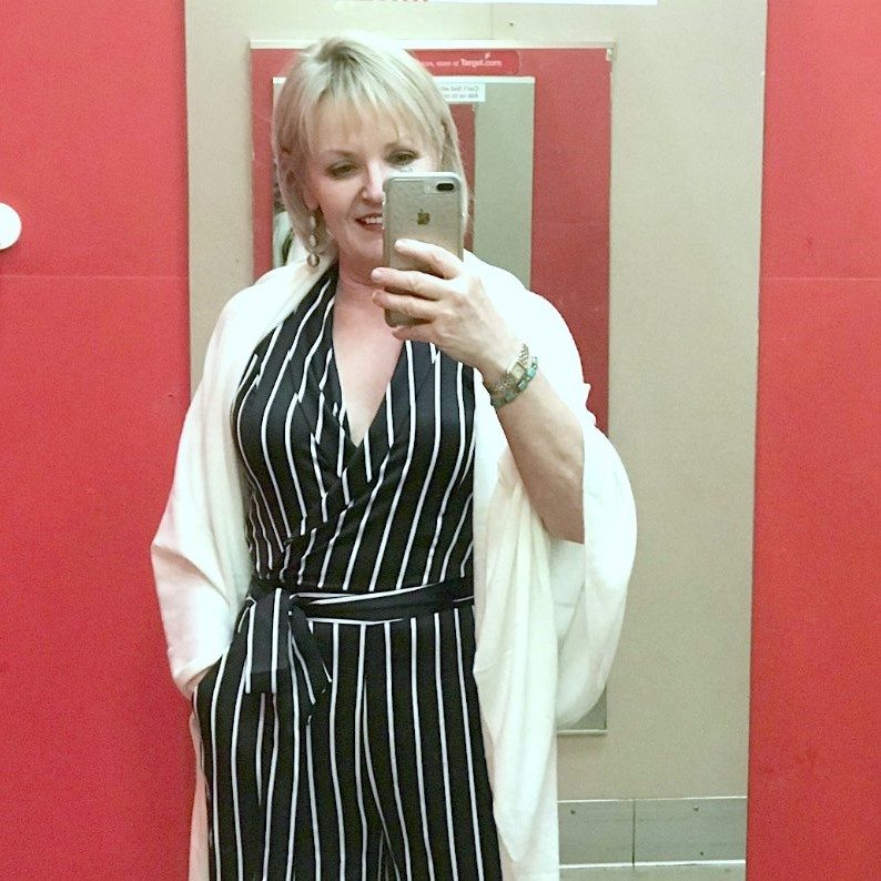 Jennifer Connolly of A Well Styled Life wearing jumpsuit from Target
