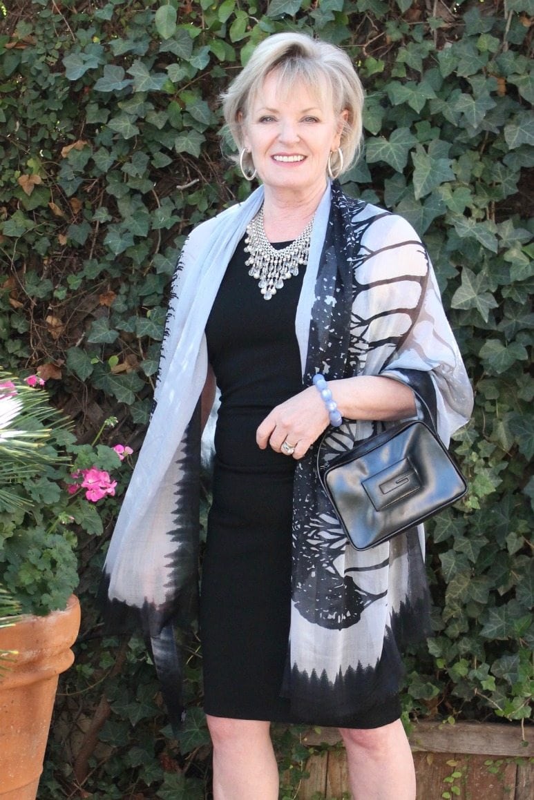 Jennifer Connolly of A Well Styled Life wearing black dress and blue wrap