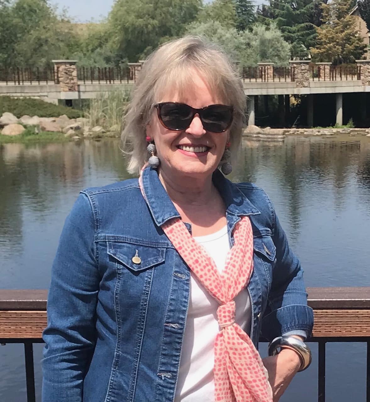 Jennifer Connolly of A Well Styled Life wearing white tee and denim jacket