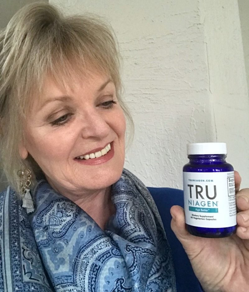 Jennifer Connolly of A Well Styled Life holding Tru Niagen bottle