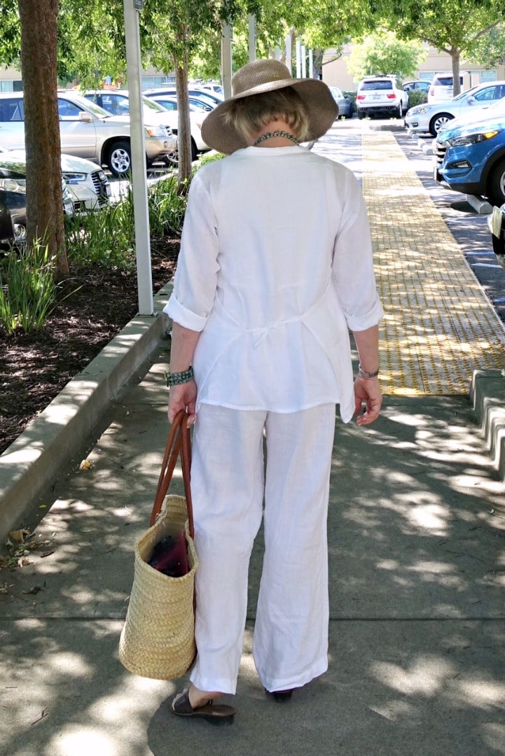 Jennifer Connolly of A Well Styled Life wearing white linen suit