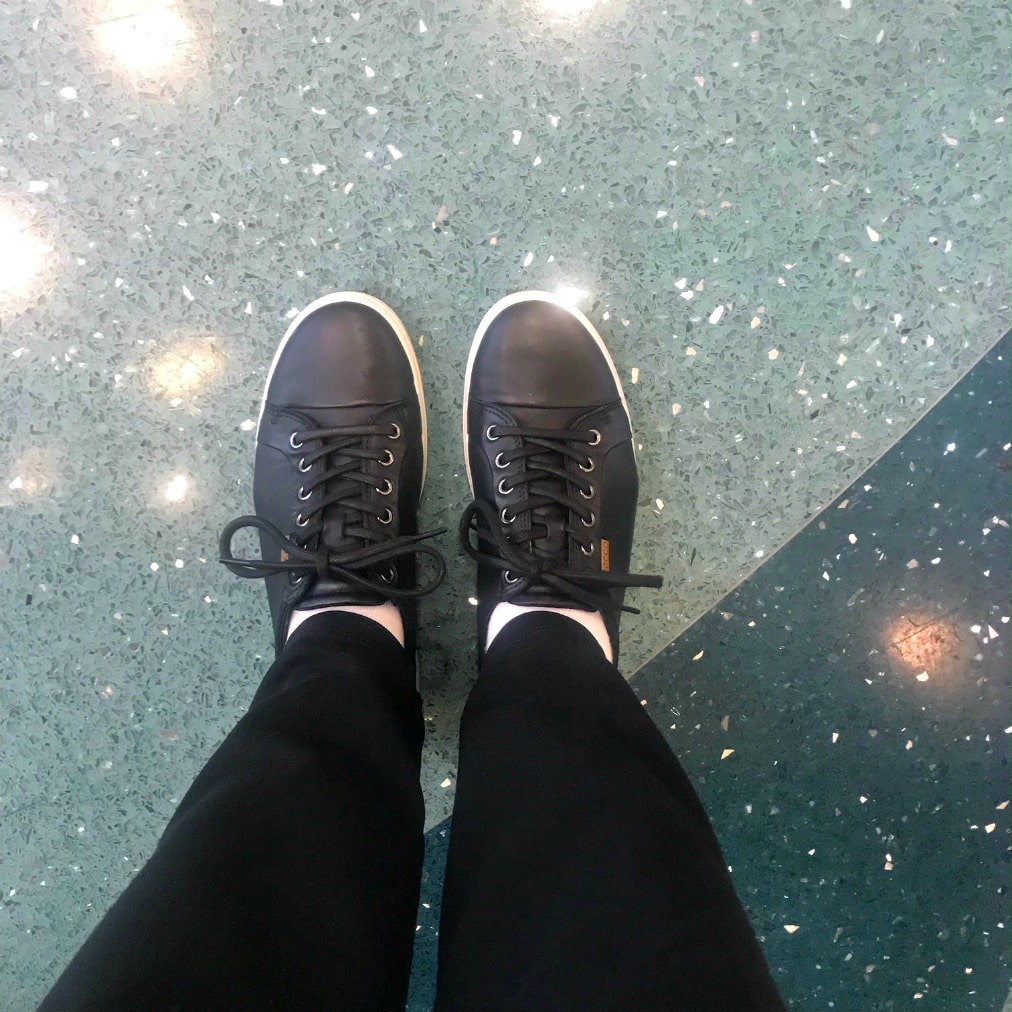Jennifer Connolly of A Well Styled Life wearing ECCO sneakers to travel