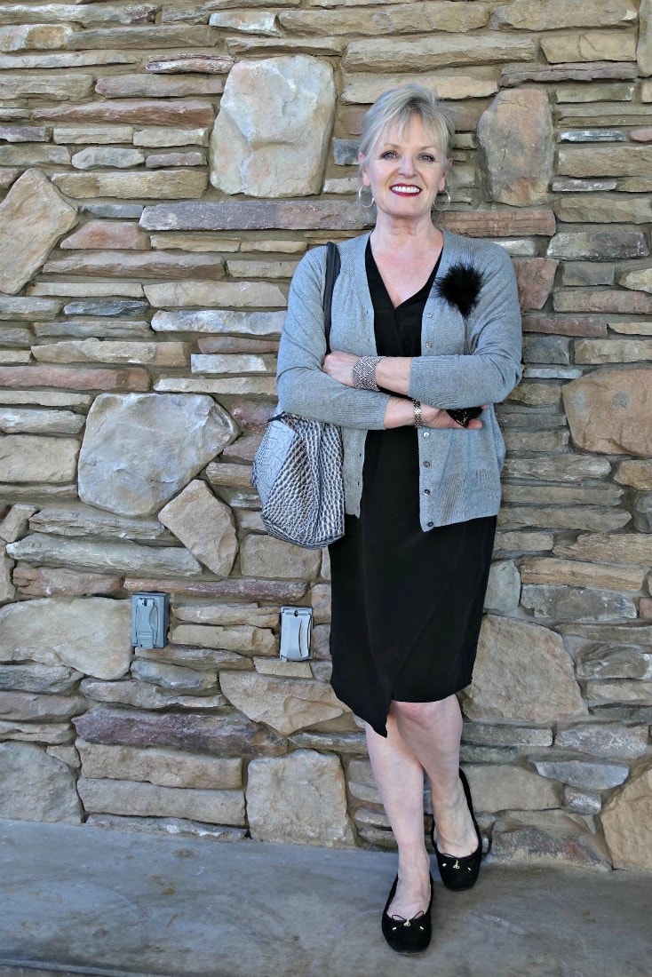Jennifer Connolly of A Well Styled Life modeling front twist dress by Lily Silk