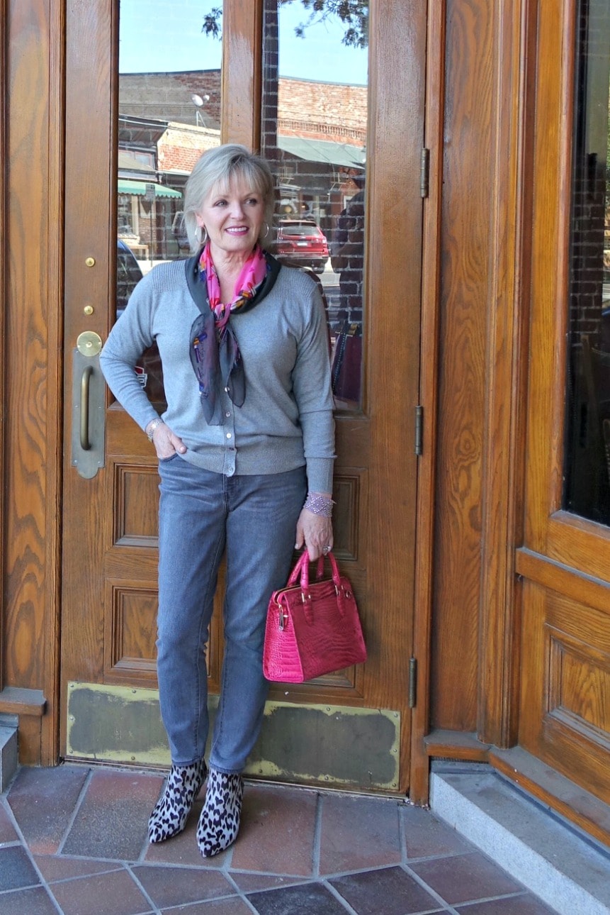 Jennifer Connolly wearing a column of gray