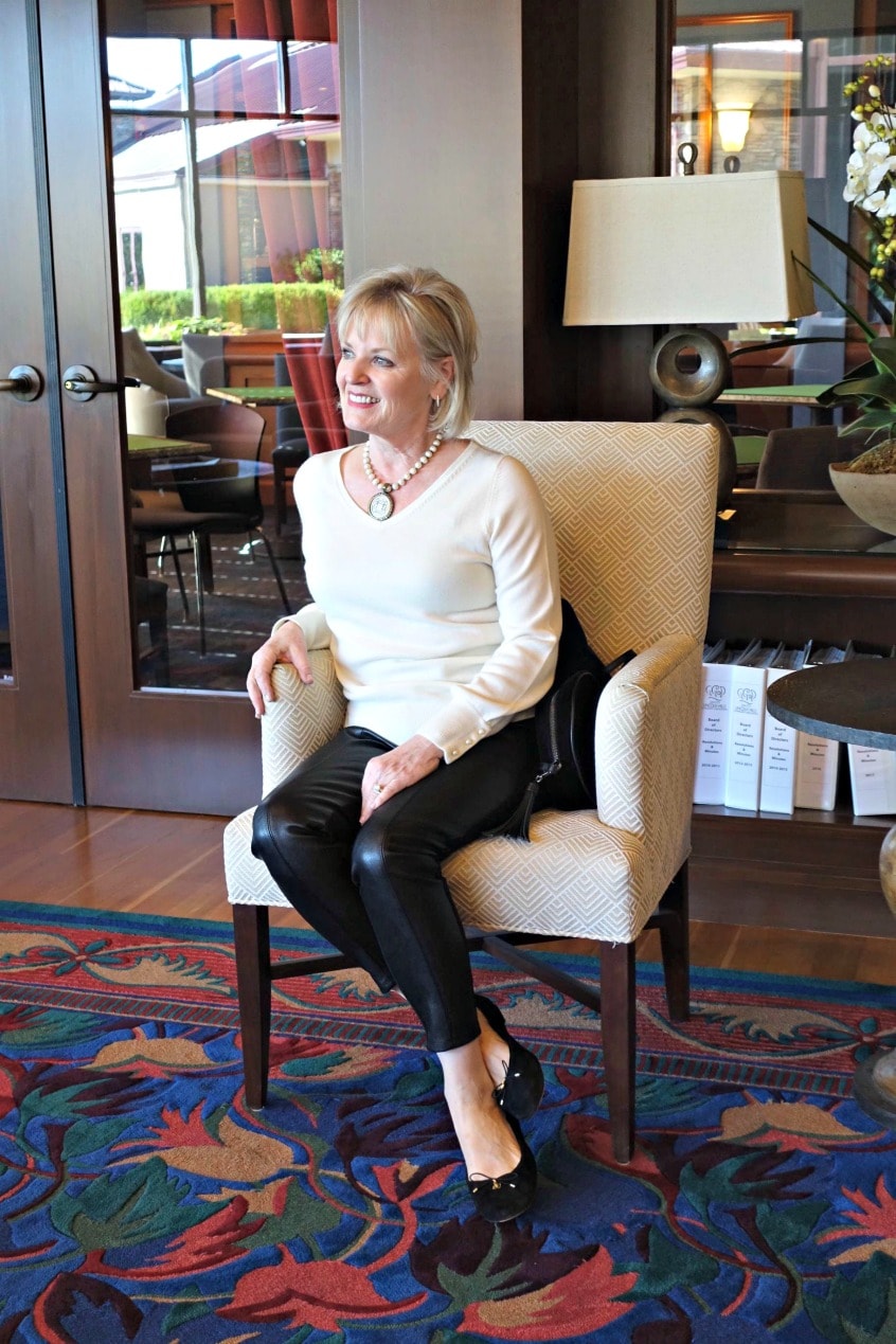 Pearl embellished sweater from Ann Taylor with faux leather leggings on A Well Styled Life
