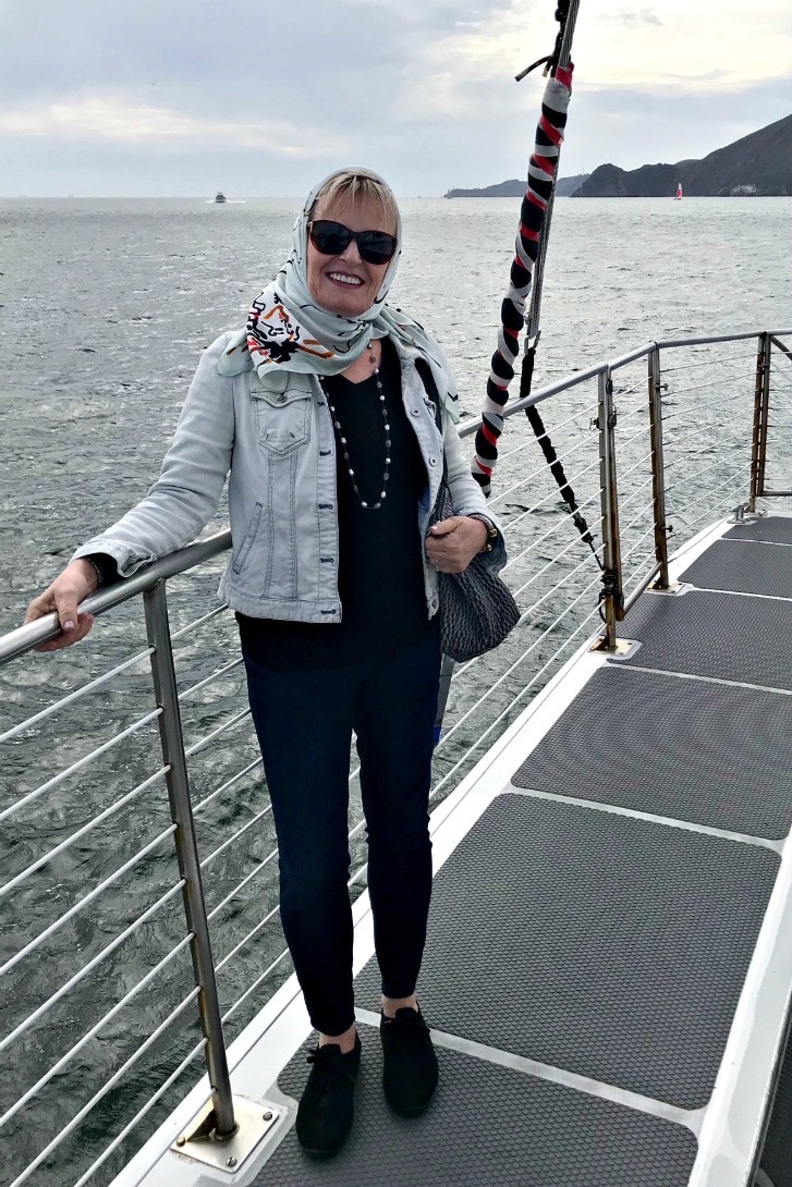 Wearing Talbots limited edition scarf to protect hair while sailing