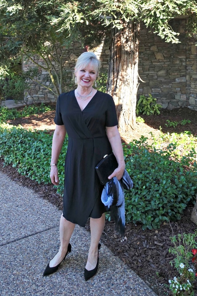 Twist friont black silk dress modeled by Jennifer Connolly of A Well Styled Life