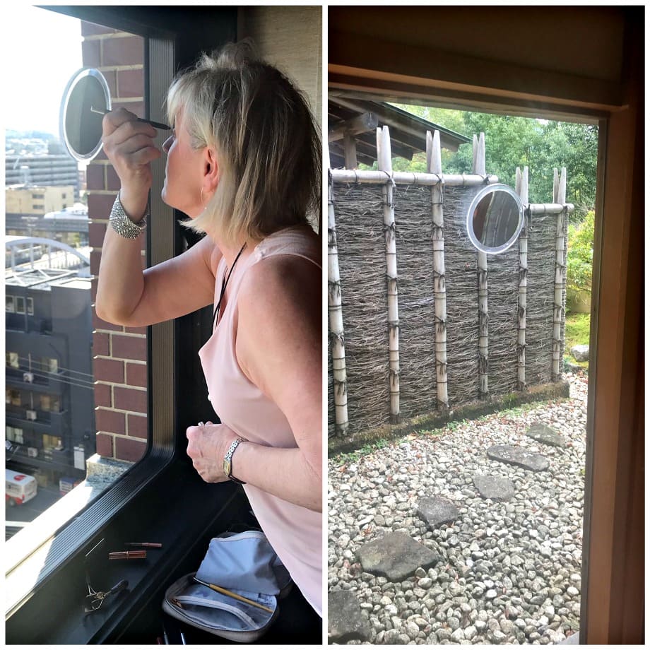 Jennifer Connolly of A Well Styled life using a suction cup traveling magnifying mirror