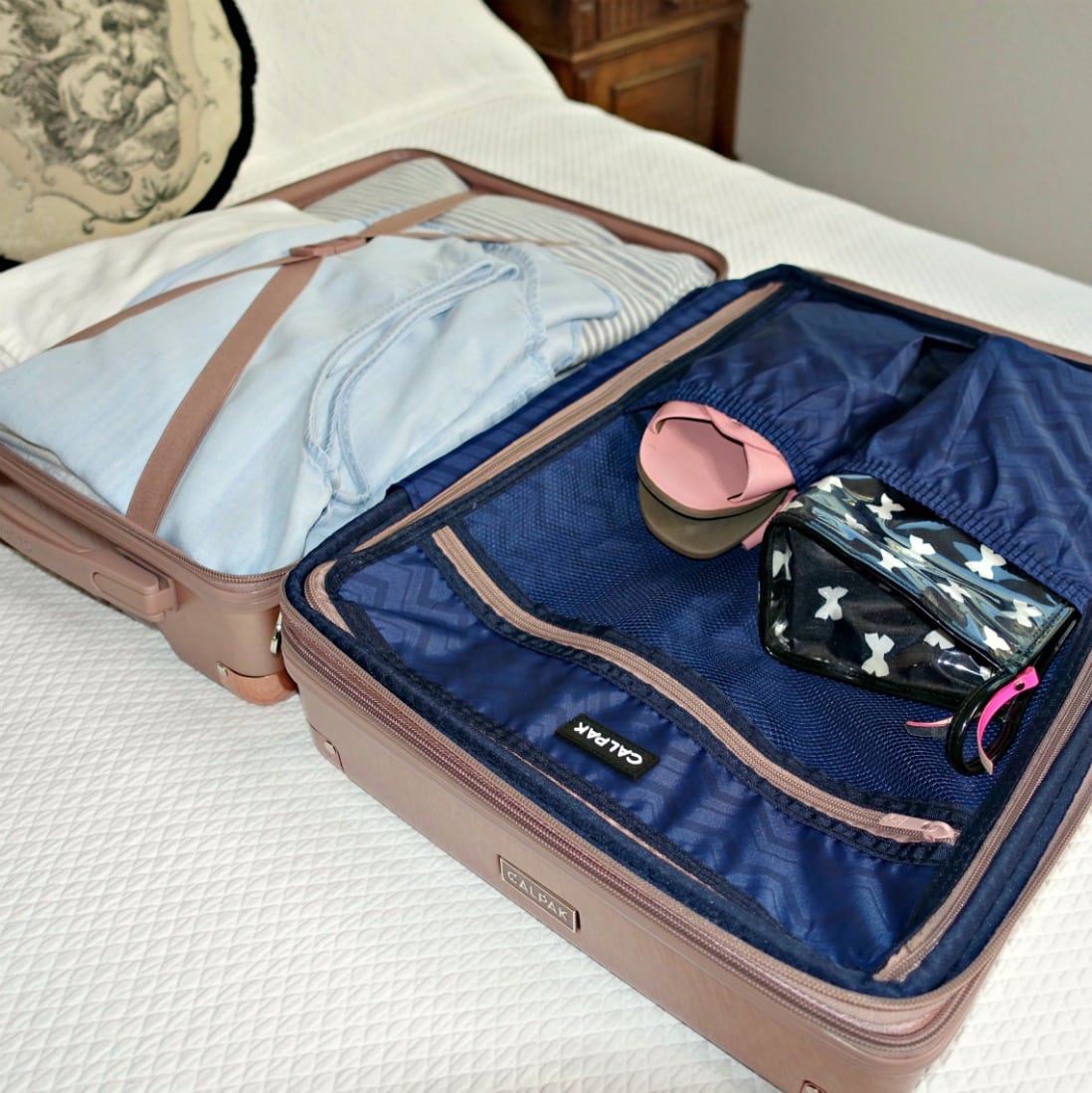 Packing a Calpak 20" spinner on A Well Styled Life