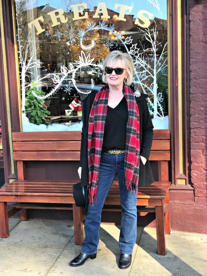 Jennifer Connolly of A Well Styled Life wearing Talbots plaid scarf with black sweater and hat