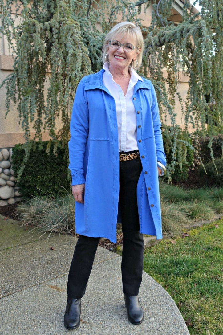 jennifer of A Well Styled life wearing Bee jacket over black jeans and white shirt
