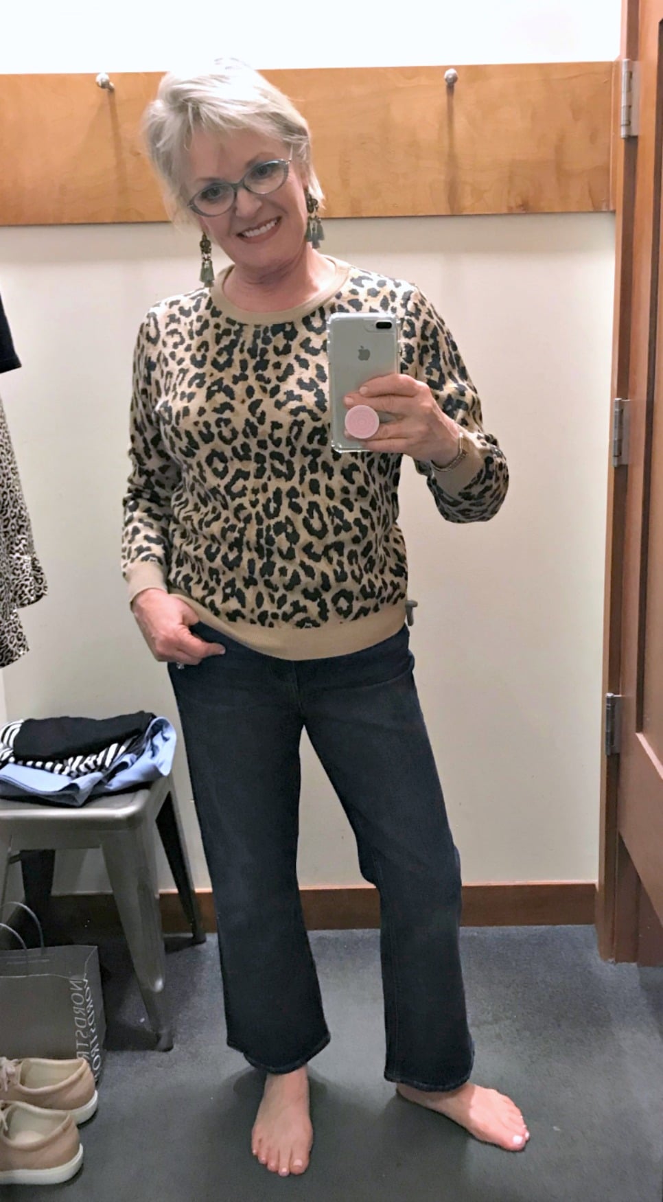 Jennifer of A Well Styled Life wearing J.Crew merino sweater in leopard print with cropped flares