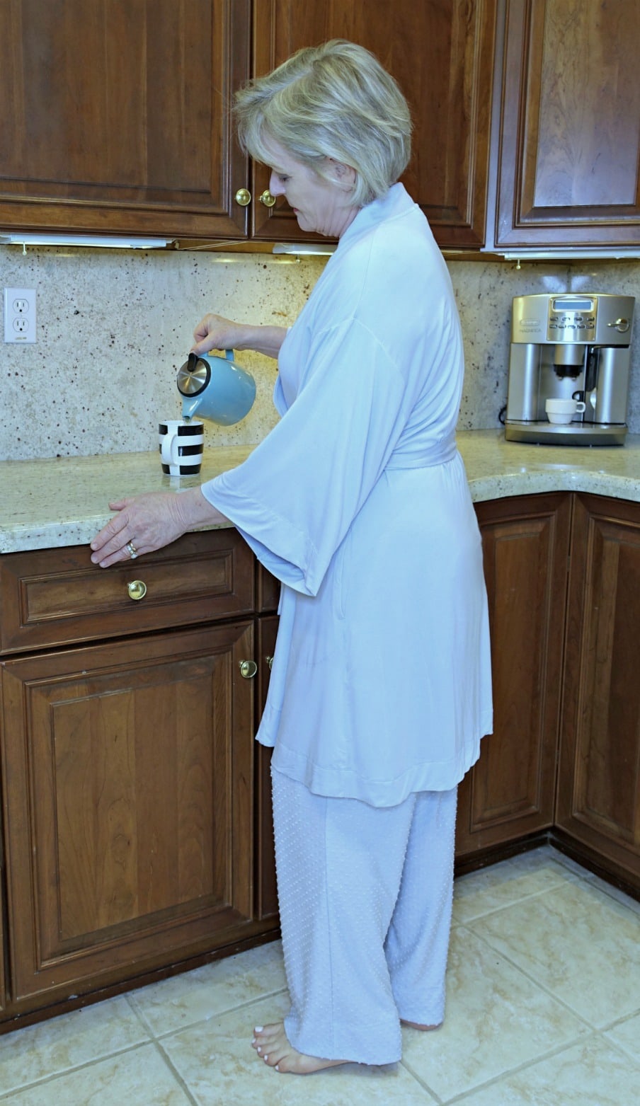 Jennifer of A Well Styled Life pouring tee in the morning wear rove and pajamas from Soma in cool blue color