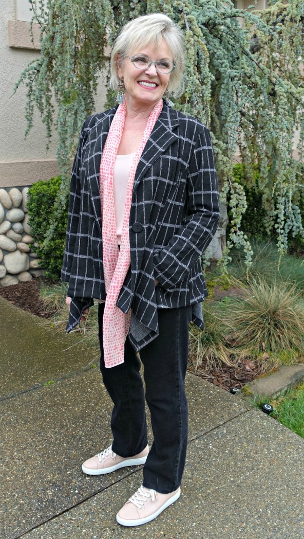 Jennifer Connolly of A Well Styled Life wearing gray plaid jacket and blush top