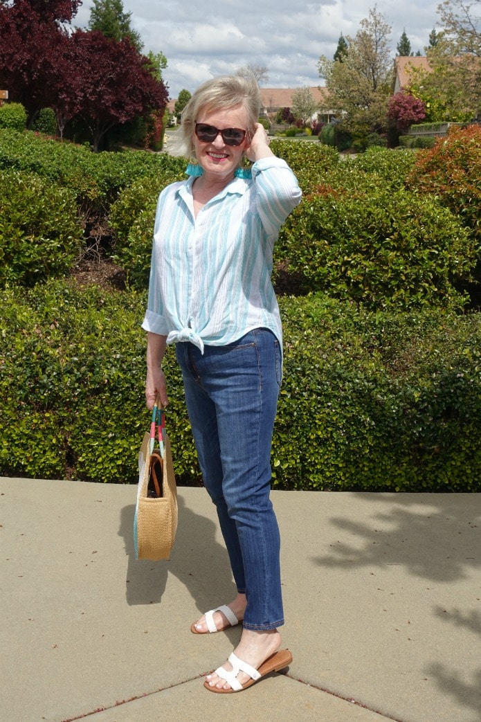 Jennifer Connolly of A Well Styled Life wearing striped shirt and blue jeans from Walmart