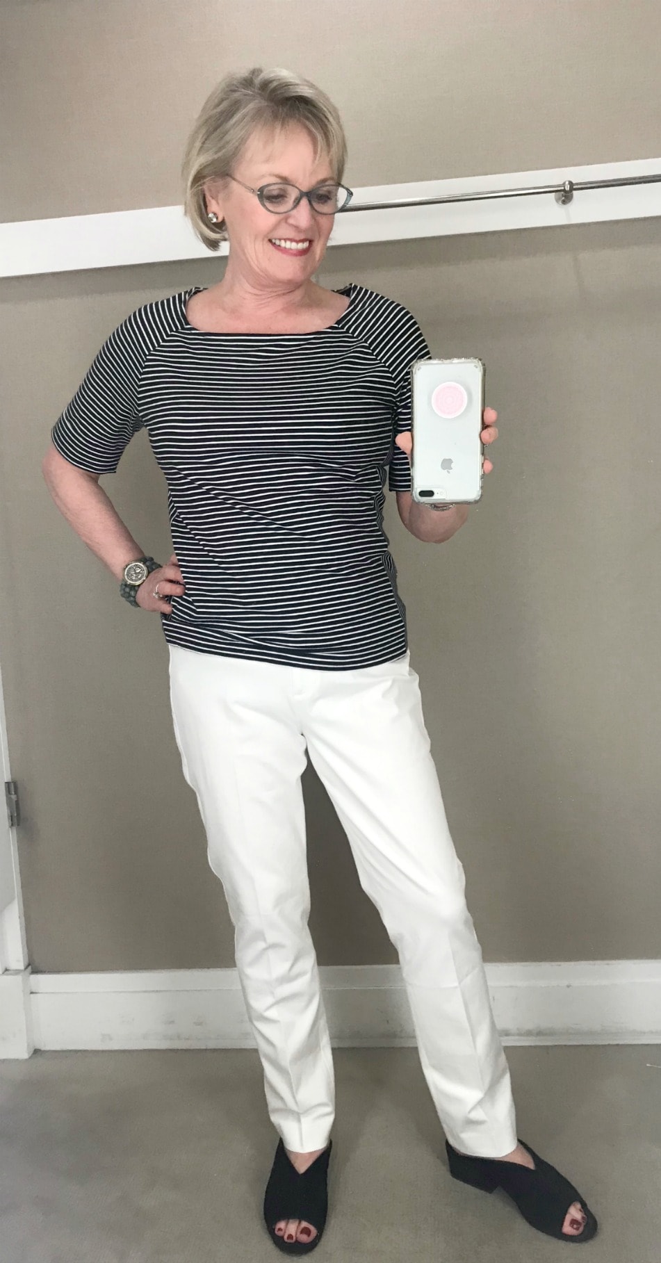 Jennifer Connolly of A Well Styled Life wears a striped tee and slim linen pant from Talbots