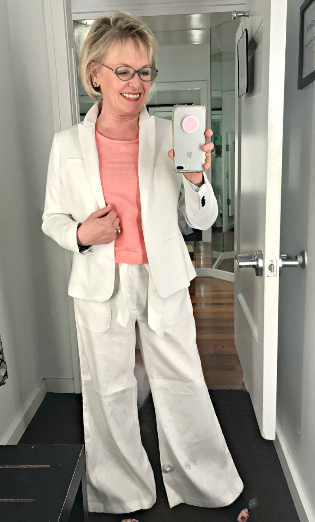 Jennifer Connolly of A Well Styled Life styling a white linen suit in Banana Republic