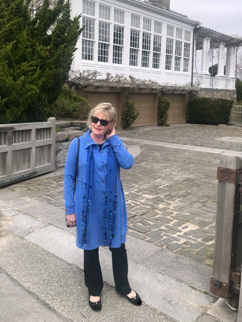 Jennifer Connolly of A Well Styled Life wearing Eileen Fisher black pants and blue fleece jacket