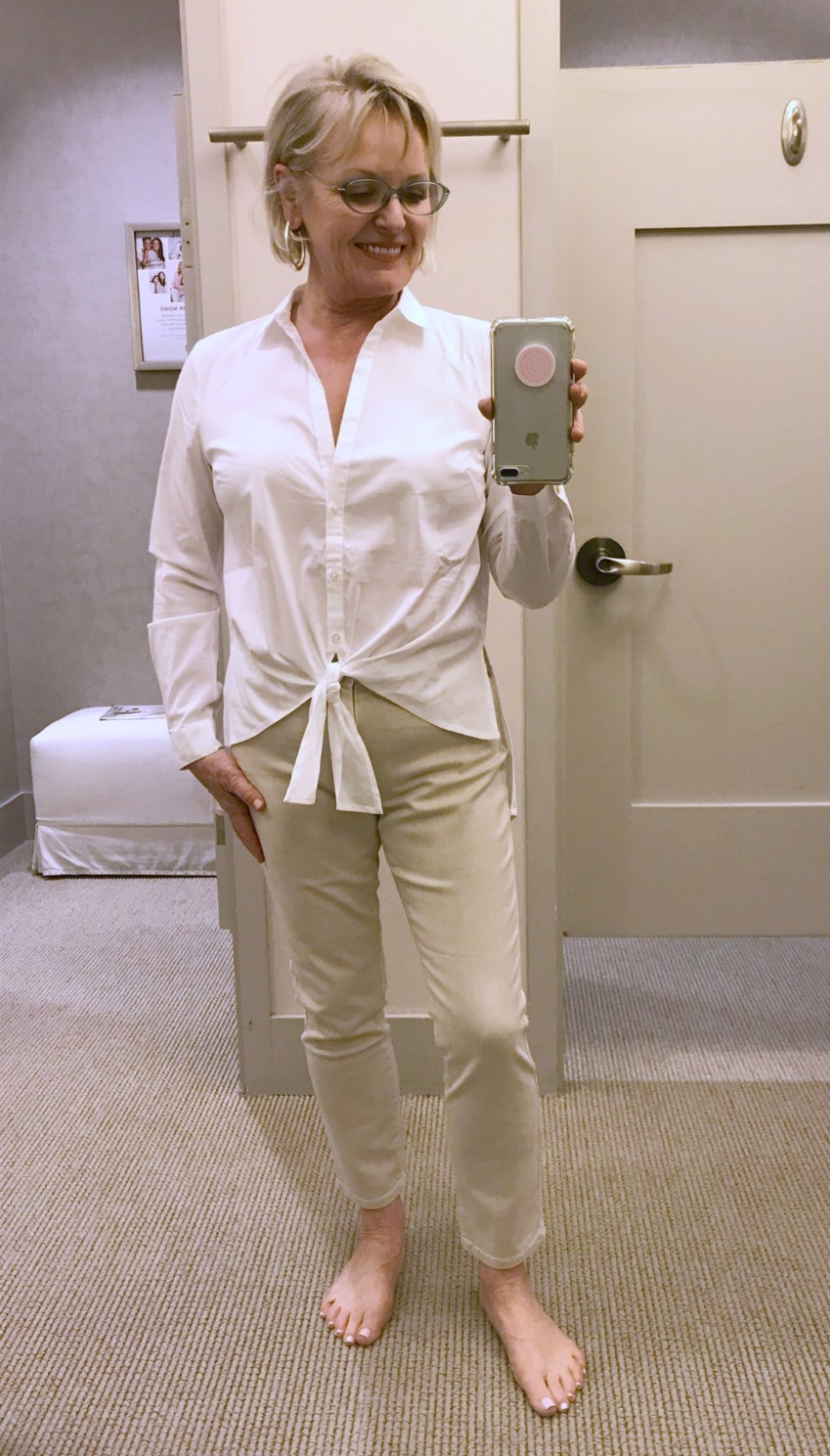 stretch white shirt and beige slim jeans on over 50 style blogger Jennifer of A Well Styled Life