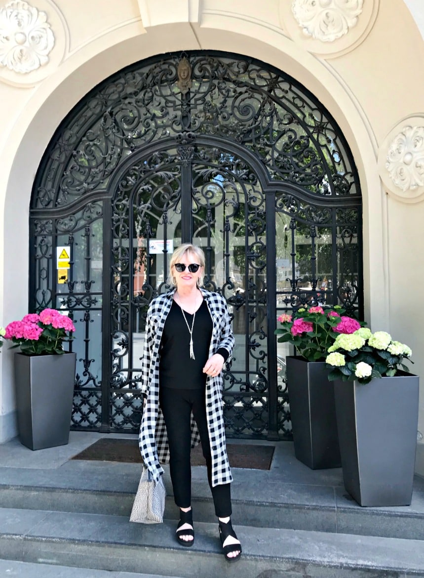 Jennifer Connolly of A Well Styled life showing how to stretch a travel wardrobe