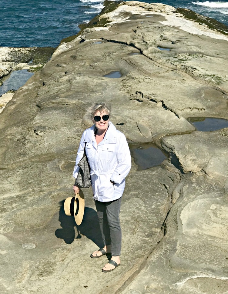 Jennifer Connolly of A Well Styled Life in white windbreaker on Malaspina Galleries