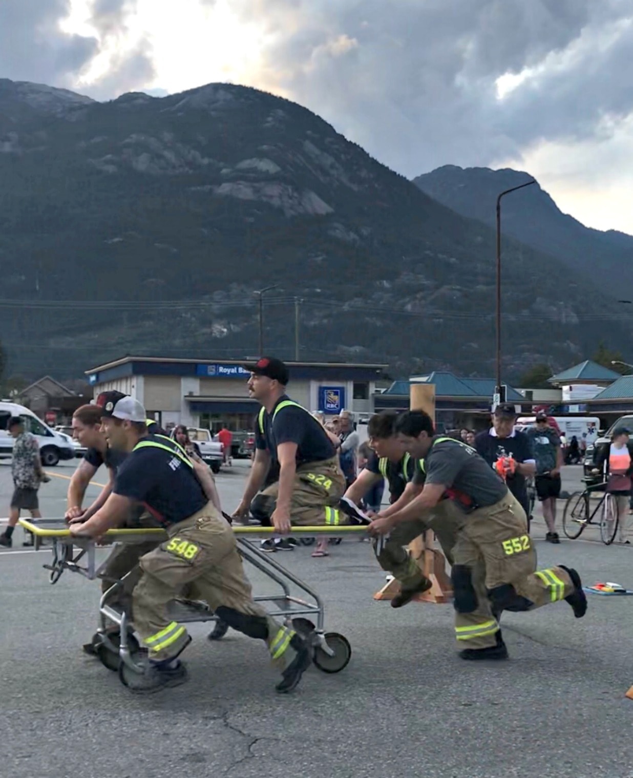 5 firefighters pushing a gurney in a bed race in Squamish BC