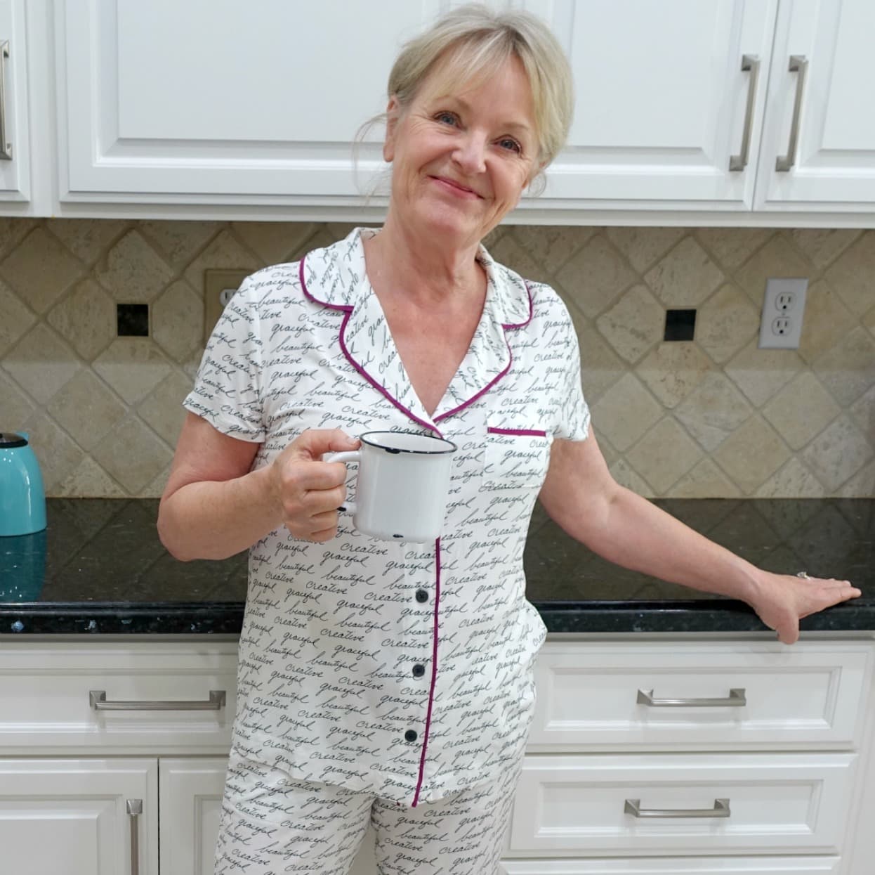 Jennifer Connolly of A Well Styled life in white kitchen wearing white pajamas by Soma