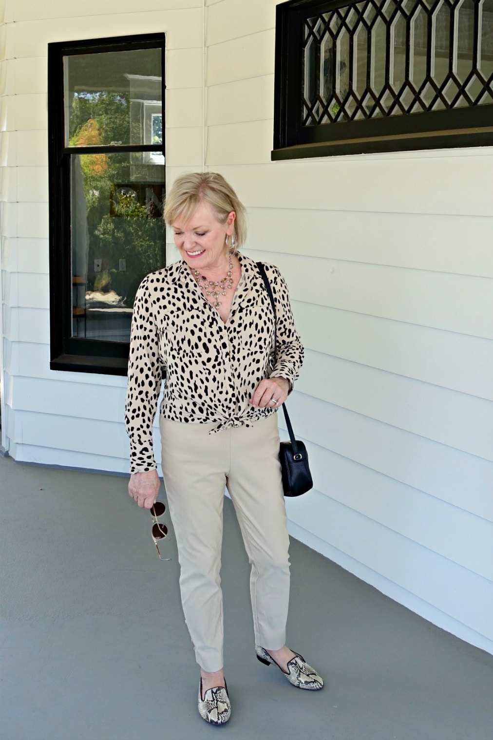Jennifer Connolly of A Well Styled Life wearing casual look combining cheetah print and snakeskin print