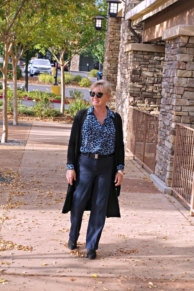 Jennifer Connolly of A Well Styled Life wearing casual look with leopard top and blue jeans