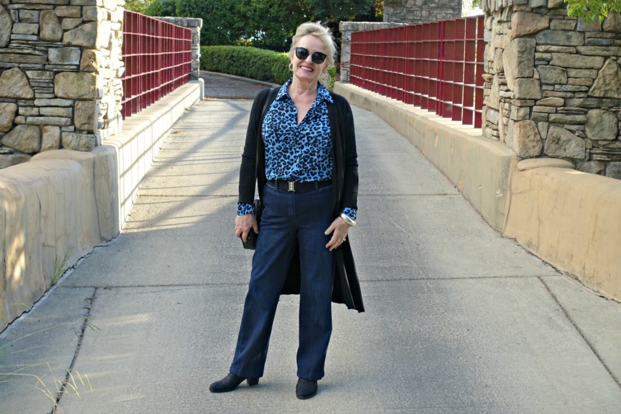 Jennifer Connolly of A Well Styled Life wearing Talbots denim trousers with blue leopard shirt