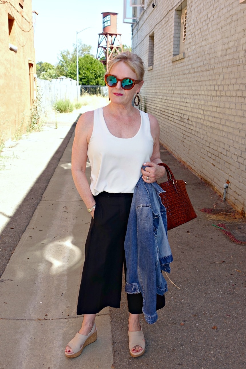 Jennifer Connolly of A Well Styled Life wearing casual outfit with denin jacket and wide crop pants from Ann Taylor