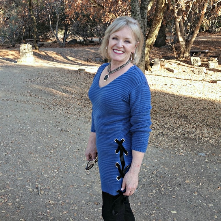 Jennifer Connolly of A Well Styled Life weaing blue tunic over vegan suede leggings