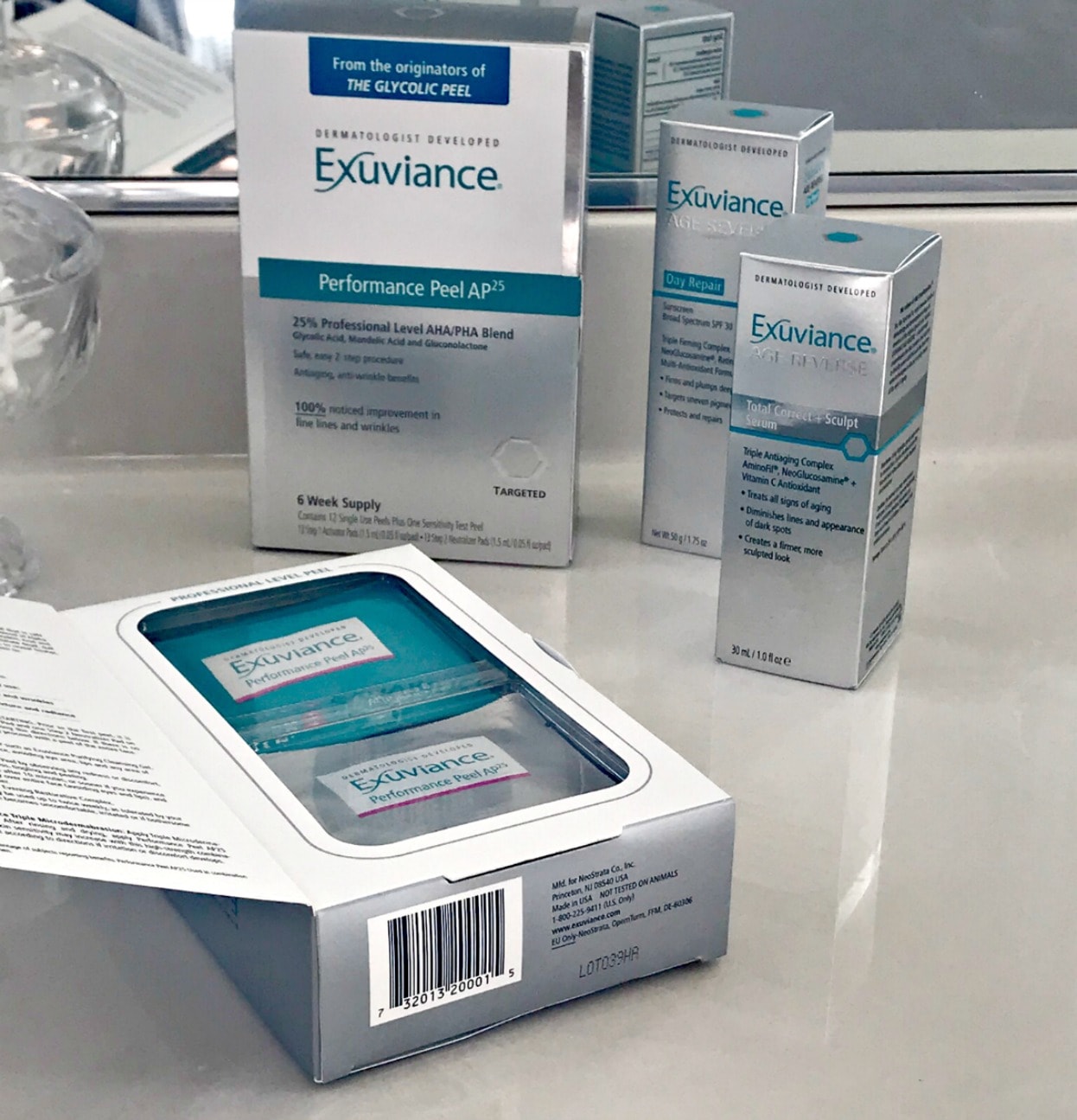 Exuviance Perfomance Peel Ap25 with serum and sunscreen