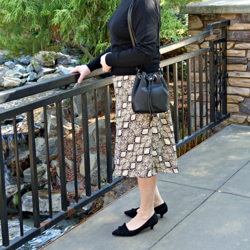Jennifer Connolly of A Well Styled Life wearing kitten heels with midi skirt