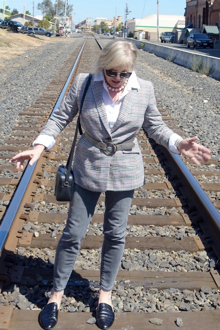Jennifer Connolly wearing a belt over a Talbots plaid jacket